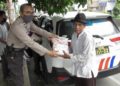 Sediakan Makan Siang Gratis Polres Serang Kota Dan Bhayangkari Cabang Serang Kota Lakukan Aksi Sosial Ditengah Pandemi Covid-19