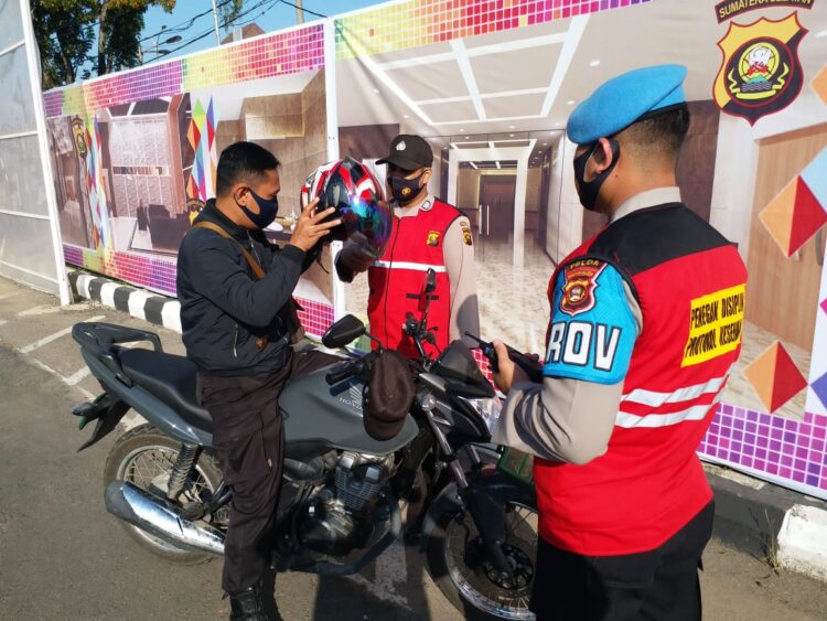 Tegakkan Disiplin Protokol Kesehatan, Propam Polda Sumsel Melaksanakan Razia Penggunaan Masker