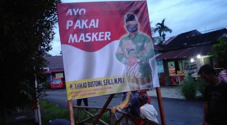 Polsek Pontianak Timur Himbau Masyarakat Penggunaan Masker Dengan Memasang Banner