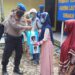 HUT Ke- 70 Satuan Polisi Perairan Dan Udara Polres Satpol Air Bagikan Sembako Ke Masayarakat