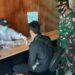 Pandemi Belum Berakhir, Koramil Sejangkung Terus Terapkan Protkes Kepada PMI di PLBN Aruk