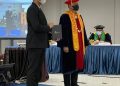 Dhiraj Kelly Sawlani Lulus Doktor Dengan Predikat Cumlaude