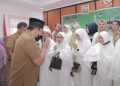 Pemko Gunungsitoli Sambut Kepulangan 12 Jamaah Haji/Hajjah Tahun 1443 H/2022 Miladiah