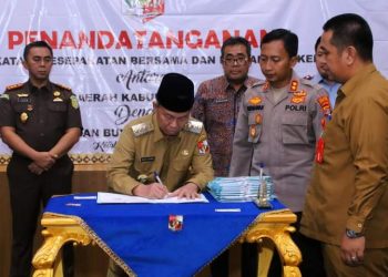 Pemkab Lampura Melakukan Penandatangan Nota Kesepakatan Bersama Perjanjian Vertikal dan BUMN Terkait