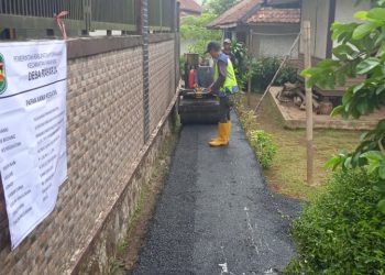 Dugaan Permainan di Balik Proyek Pengaspalan Jalan Lingkungan di Desa Raharja